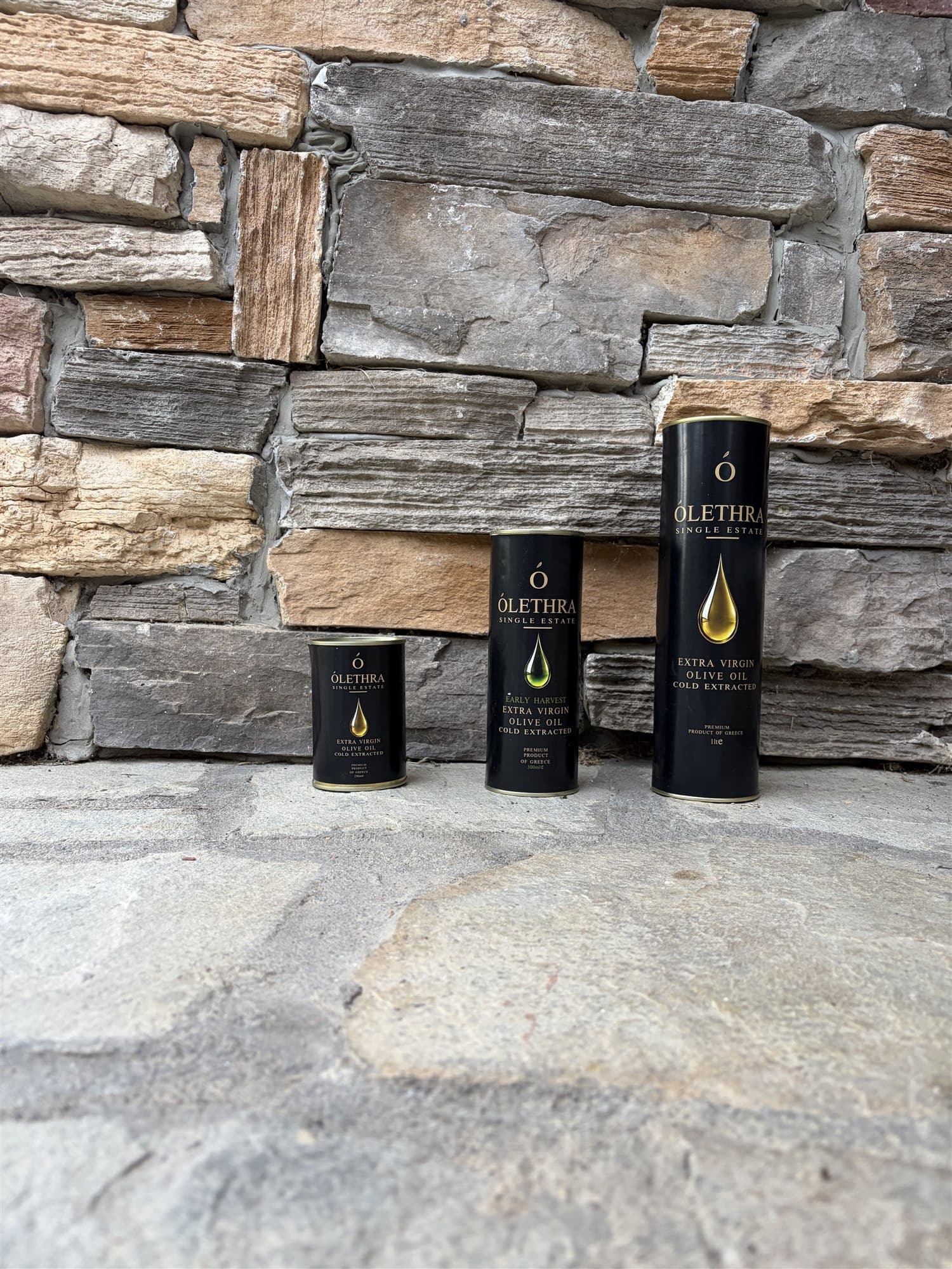 OLETHRA Extra Virgin Black Collection in premium cylindrical packaging